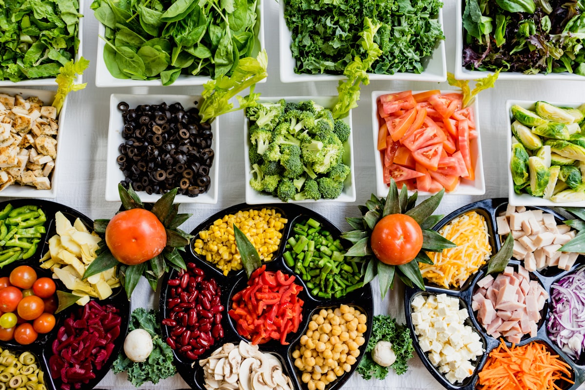 Colorful array of fresh healthy foods arranged in containers